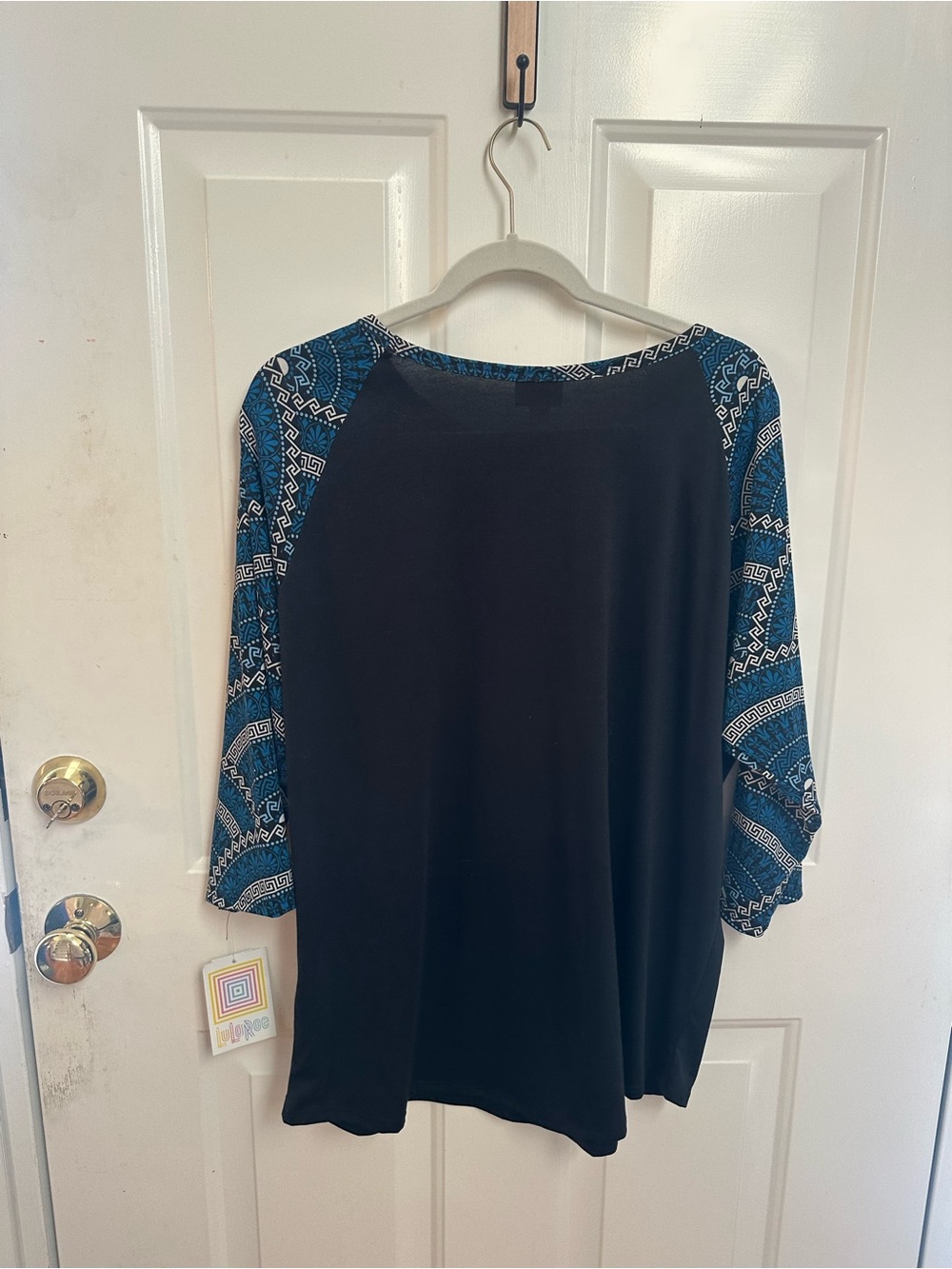 LuLaRoe Black Top with Blue Patterned Raglan Sleeves - Picture 2 of 3